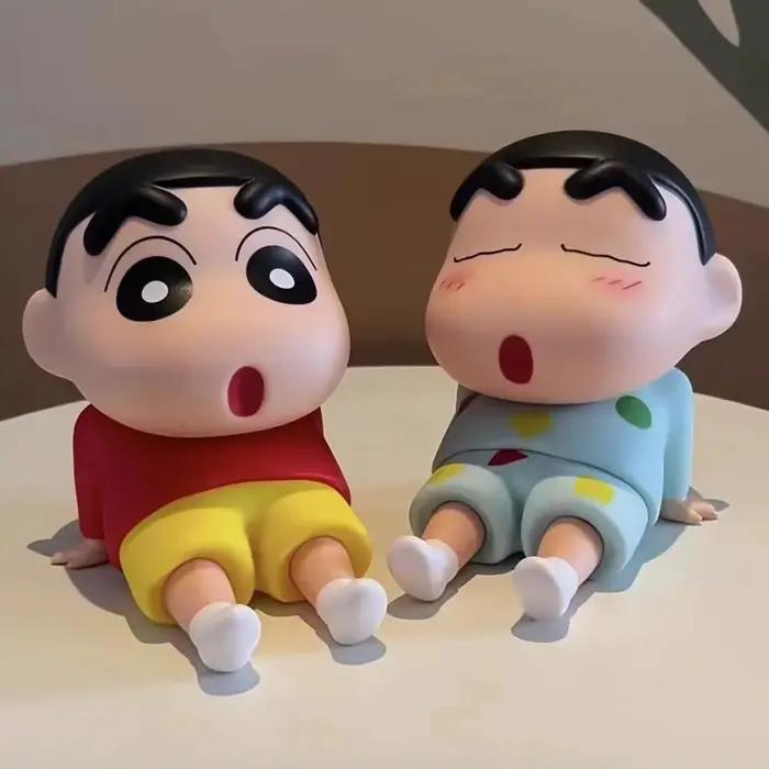 Crayon Shin-Chan figurines Support pour téléphone Kawaii Anime ornements de bureau dessin animé regarder la télévision Support de téléphone décorations de poupée mignonnes