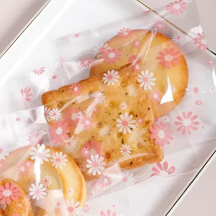 Sacs d'emballage en plastique, 100 pièces, sacs auto-adhésifs à fleurs pour Biscuits, bonbons, biscuits, bijoux, emballage cadeau