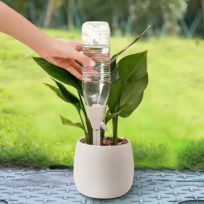 Dispositif d'arrosage automatique de fleurs pour plantes en pot à la maison