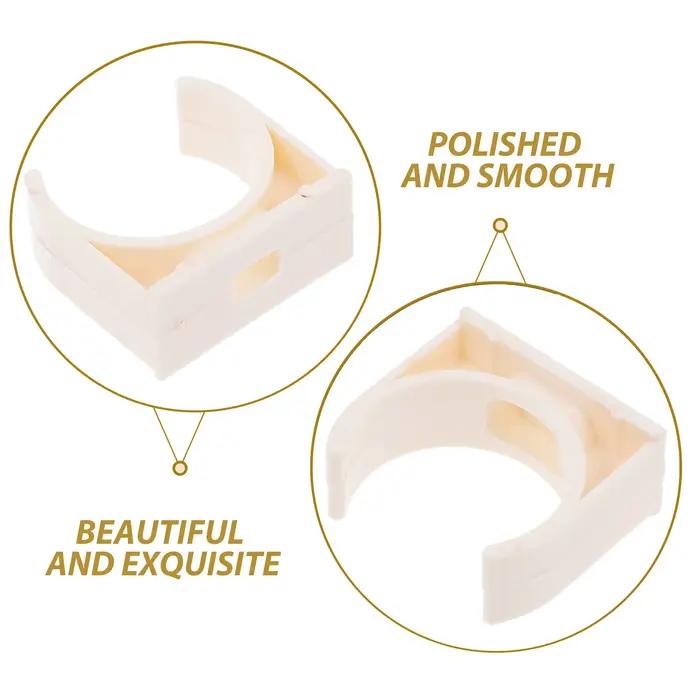 Serre-tuyaux en plastique PVC en forme de U